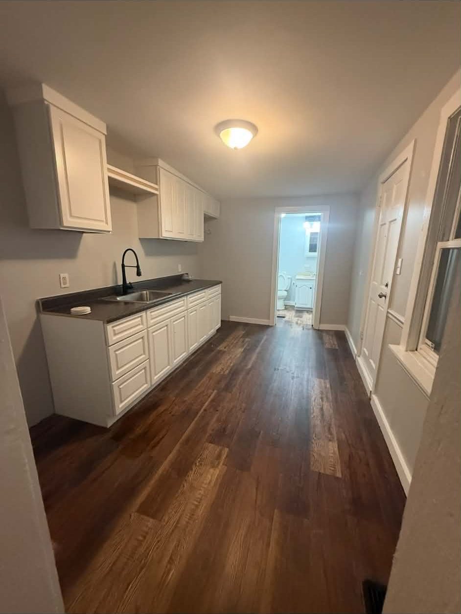 Finished bedroom with gray carpet